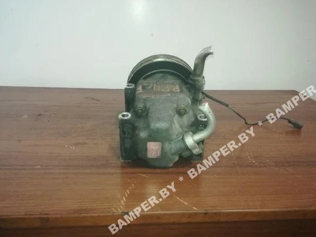 Компрессор кондиционера к Mazda 323, 2001 г.